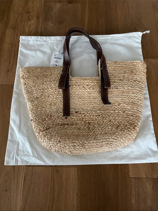 Zara Handbags - Zara Woven Straw Tote Bag with Brown Leather Handles